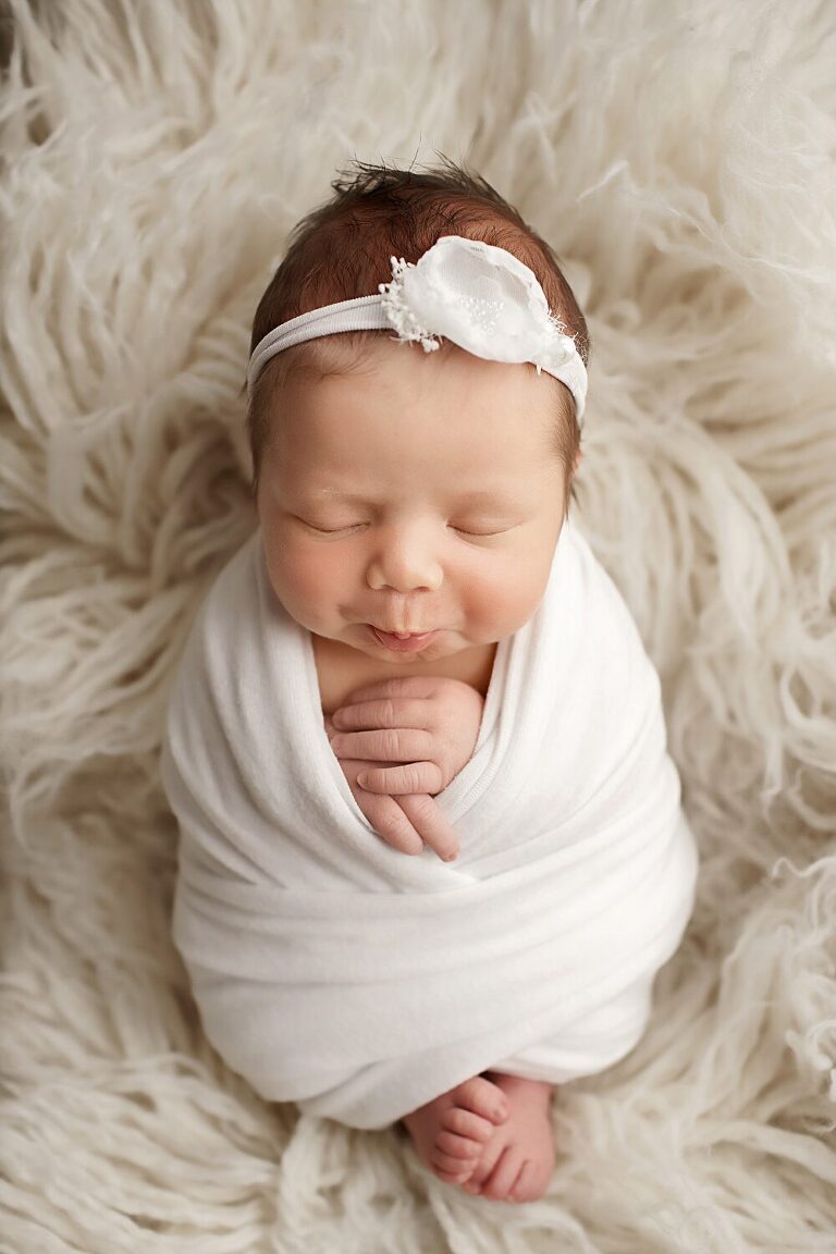 newborn portraits, baby girl swaddled in white