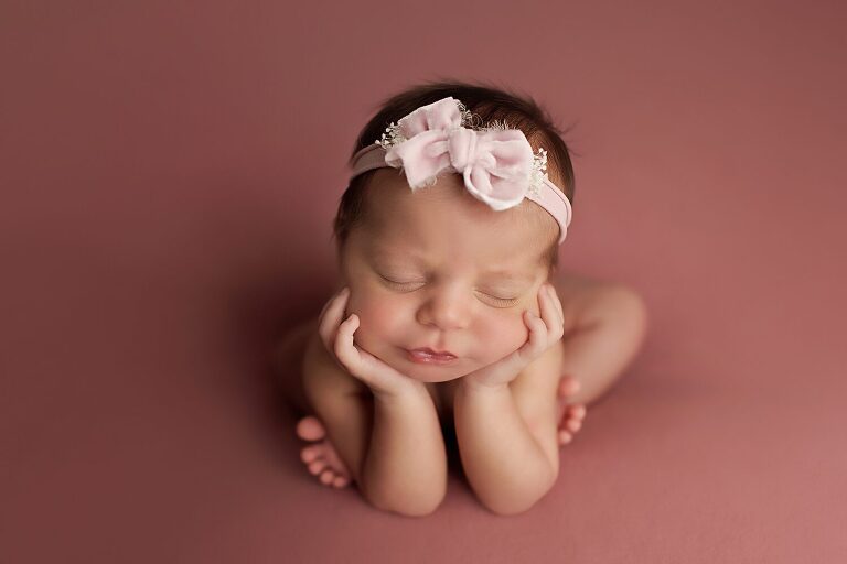 baby girl with pink headband, fort worth newborn photographer