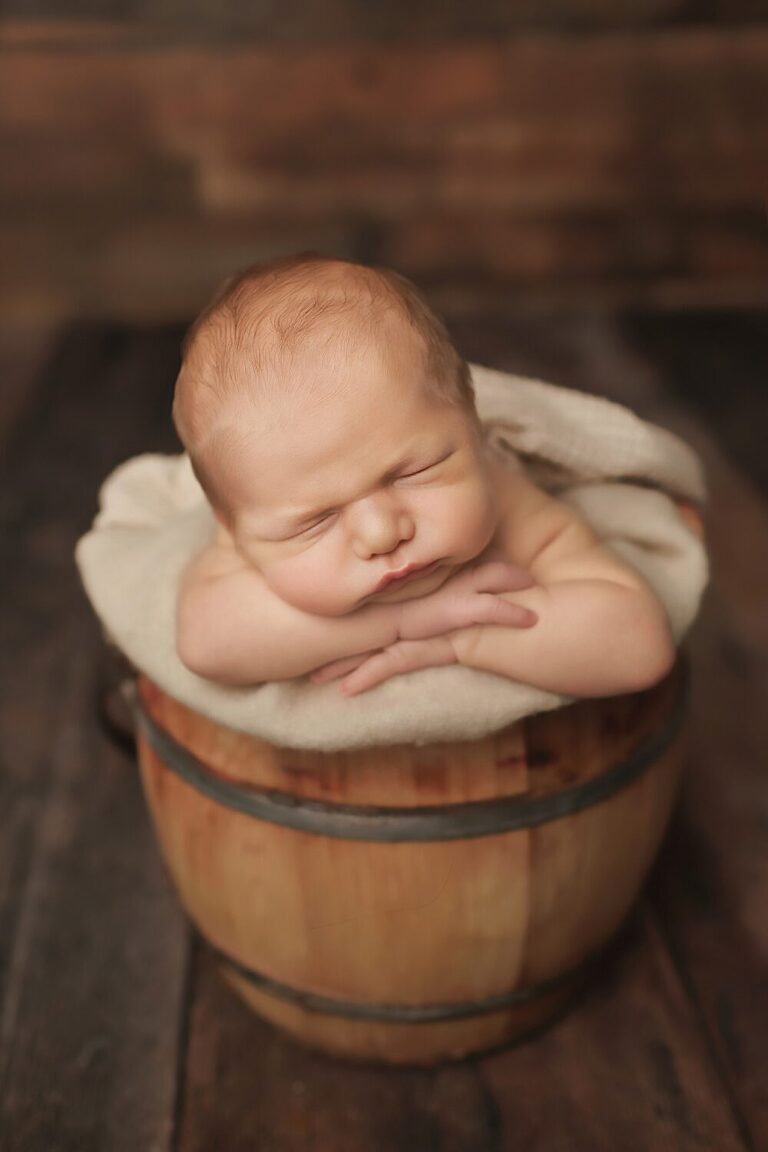 baby photography Fort Worth Texas, infant boy asleep in bucket